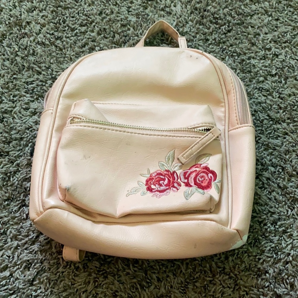 Cute backpack cream color with roses